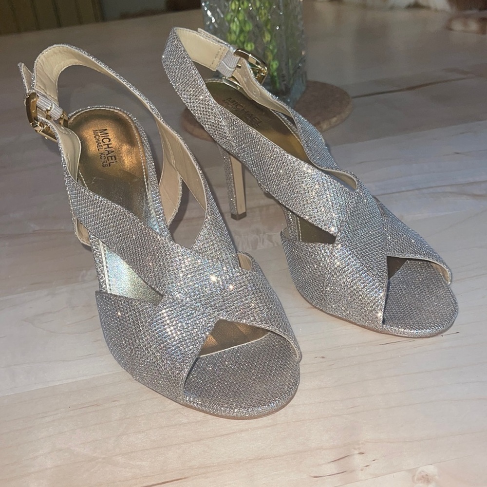 Micheal kors heels gold shimmering size 8 1/2. Worn once